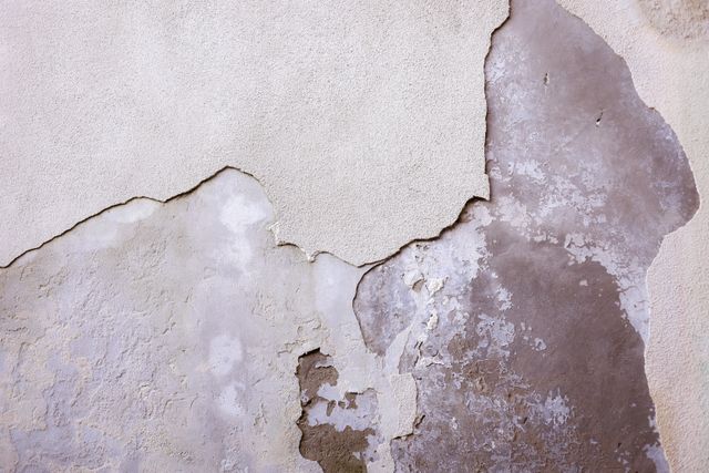 Spalling and crumbling exterior stucco